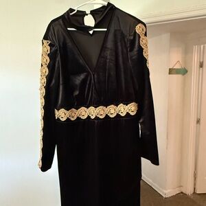 Elegant Black Dress with Gold Lace Accents